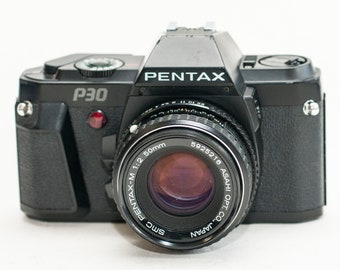 Pentax P30 film camera with 50 mm F2 SMC PENTAX-M lens