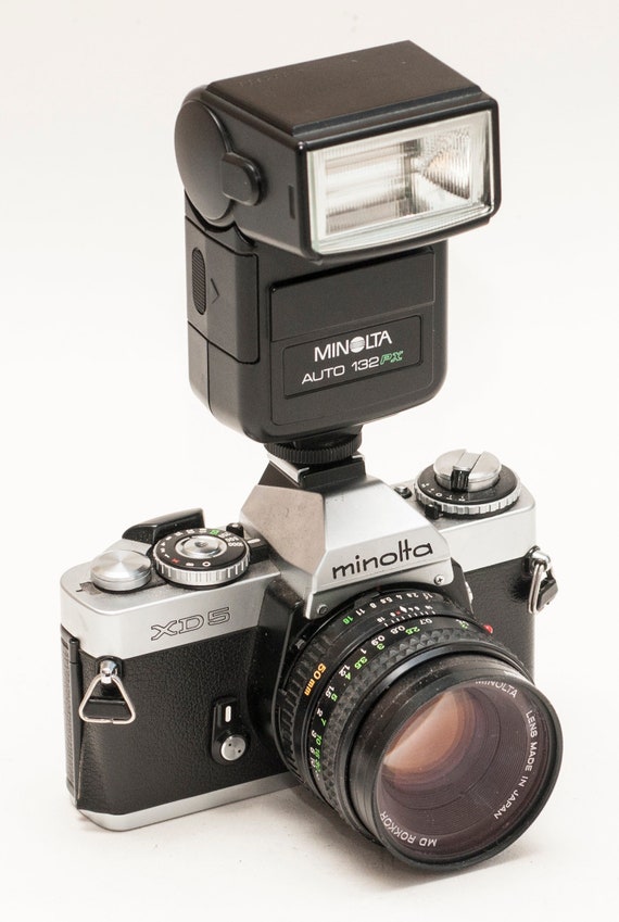 Flash Minolta Auto 132PX – Monture Griffe – Guidée TTL – Occasion Fonctionnel
