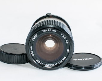Vivitar lens 28-70 mm f3.5-4.8 Olympus om fitting.