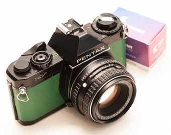 Pentax MV 35mm Film Camera with SMC Pentax-M 50mm f/2 and B&W KENTMERE film 36 frames. New green skin refurbished.