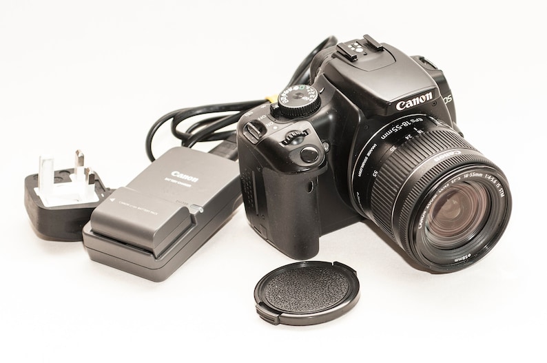 Digital camera. Canon EOS 400D with 18-55 mm f/4-5.6 IMAGE STABILISATION lens. image 1