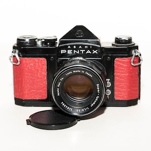 Vintage 35 mm film camera Pentax ASAHI S1a with Super-Takumar 55 mm f/1.8 lens.