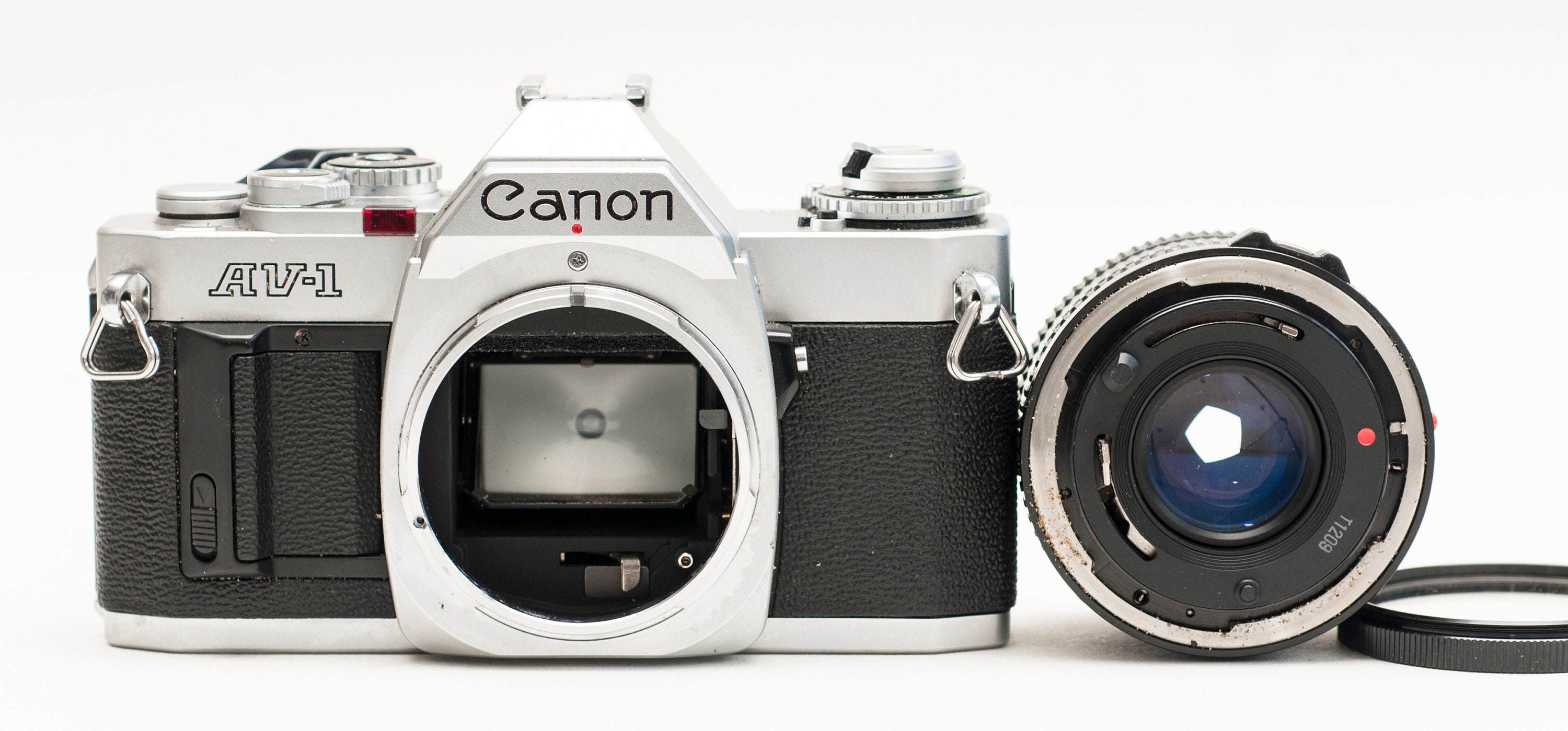 Canon AV1 film camera with 50 mm f/1.8 lens and 2 film rolls. Etsy