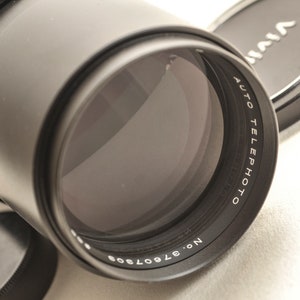 300 mm f/5.6 M42 screw VIVITAR lens.