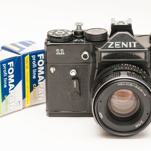 Film camera ZENIT 11 with HELIOS 44-M 55mm f/2 lens and two B&W FOMAPAN film - new.