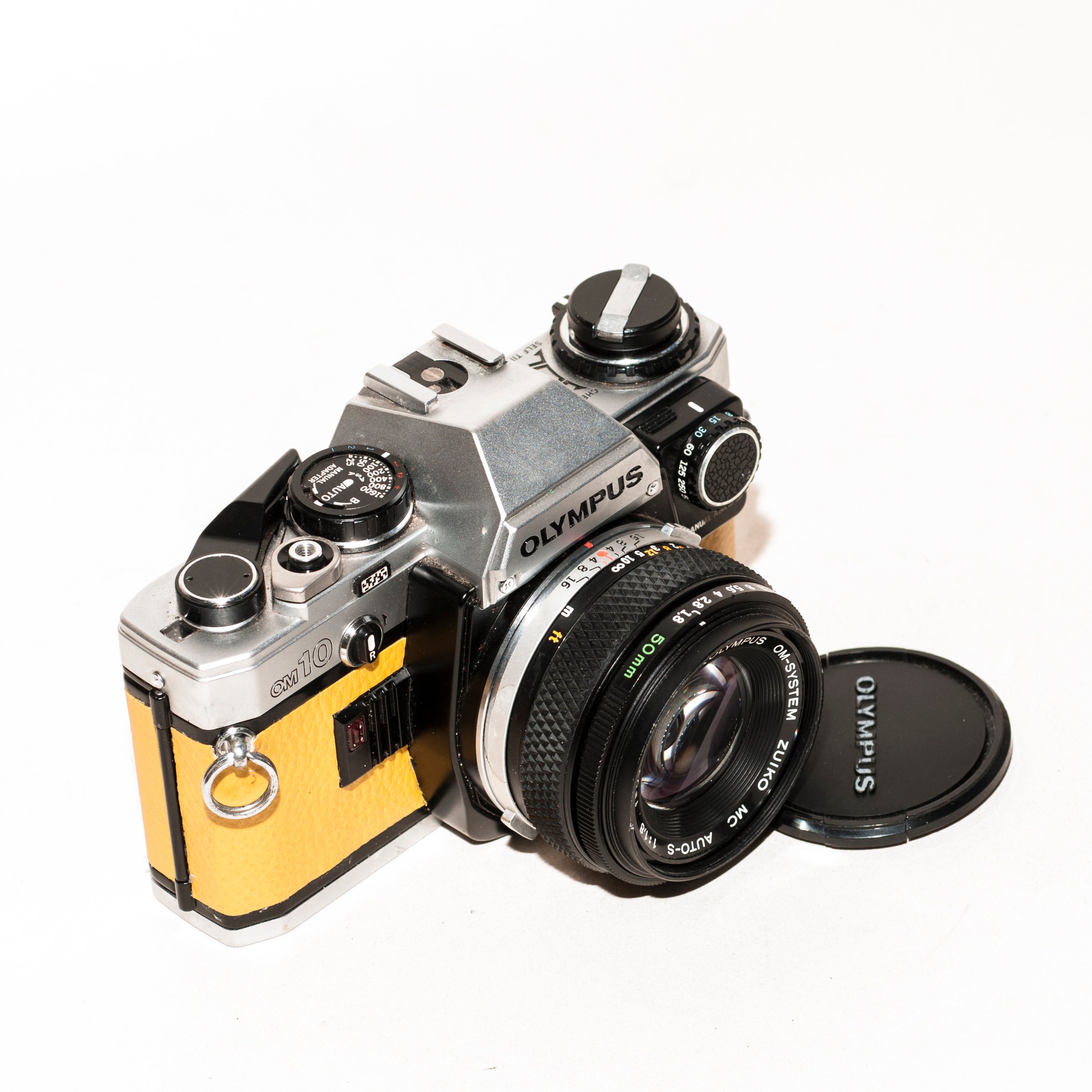 オリンパス OM 10、ZUIKO 50 mm f/1.8 レンズ、マニュアルアダプター