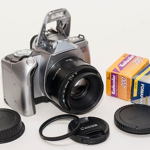 Canon EOS 300V film camera with Canon EF lens 50 mm f/1.8 II and two films