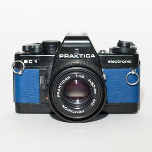 Appareil Photo Reflex Praktica BX20S + 4 Objectifs + Mallette – Très Bon état