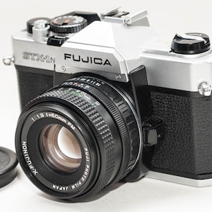 Vintage 35 mm film camera FUJICA STX-1N witch 50 mm 1.9 X-FUJINON lens.