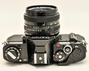 Canon AV-1 フィルムカメラ - ブラック、50 mm f1.8 レンズ - Etsy 日本