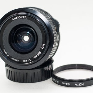 MINOLTA MD  lens 28 mm f/2.8 .. Portrait or everyday photography.