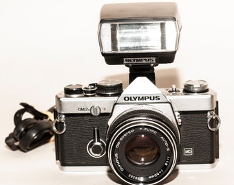 Olympus OM 2N MD with ZUIKO 50 mm f/1.8 lens.