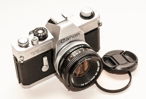 Canon TLB film camera with 50 mm 1.8 FD/SC lens.