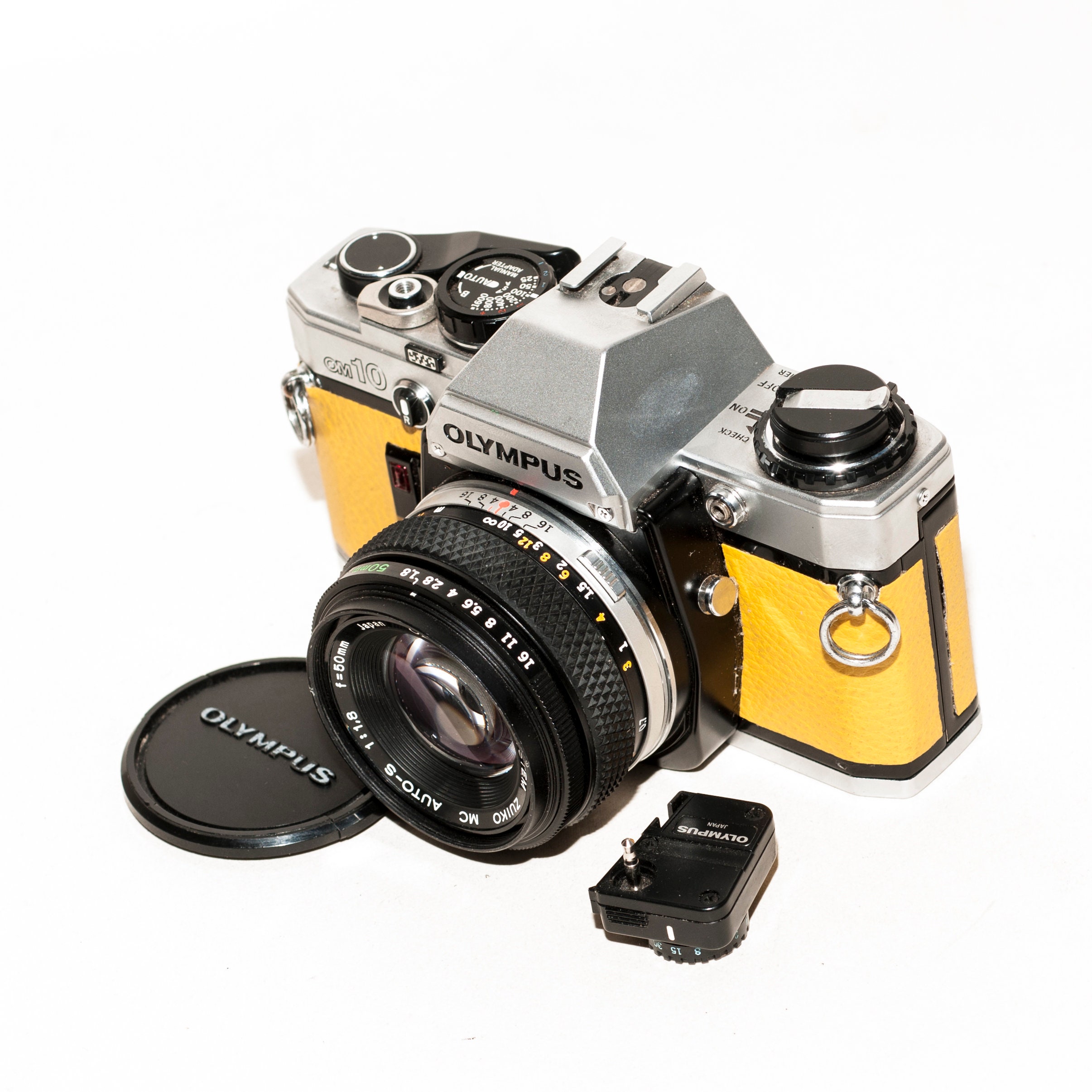 オリンパス OM 10、ZUIKO 50 mm f/1.8 レンズ、マニュアルアダプター