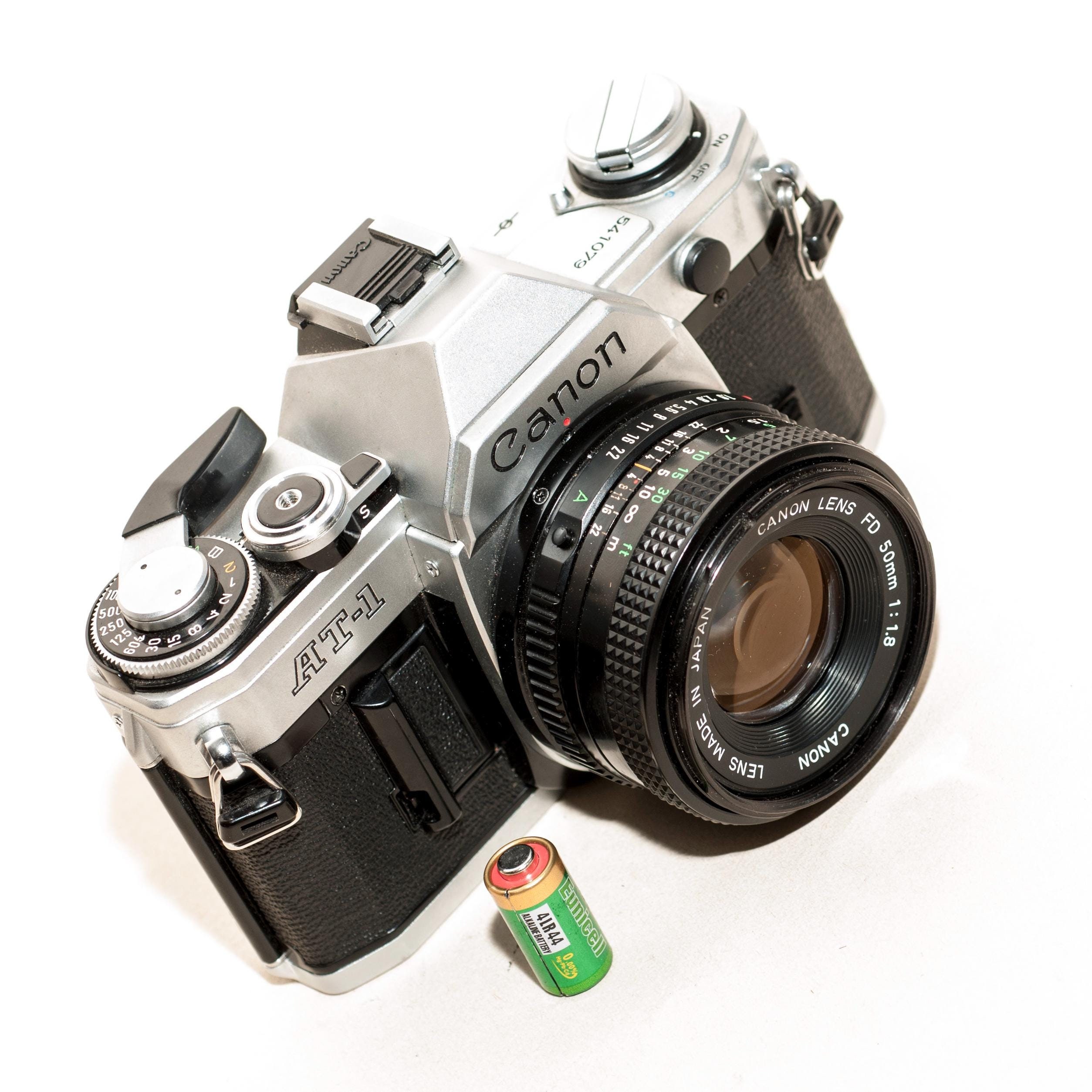 Canon AT-1 フィルムカメラ 50mmレンズ付き Canon AT-1 35mm Film Camera with 50mm lens (1977) – Relics