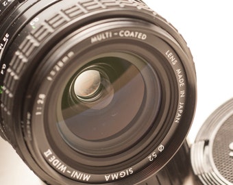 Praktica PB fitting SIGMA wide angle lens 28 mm F/2.8 - MINT.