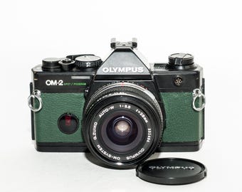 Olympus OM 2 SPOT PROGRAM with 28mm f/3.5 Zuiko lens - green khaki