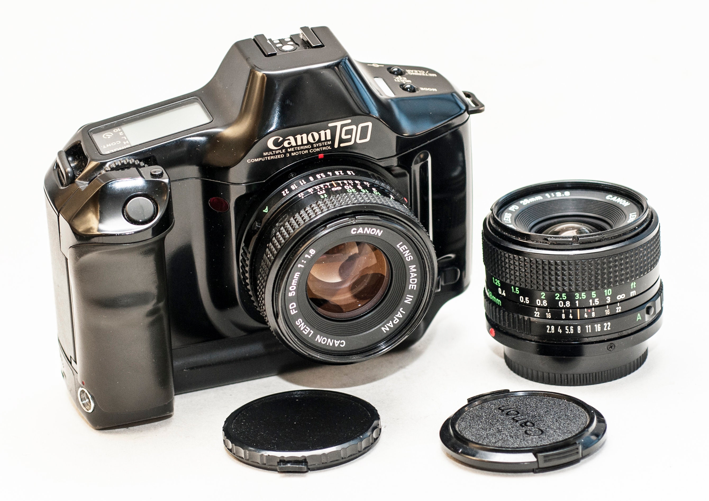 Canon T90 film camera with two Canon FD lenses 50 mm f1.8 and