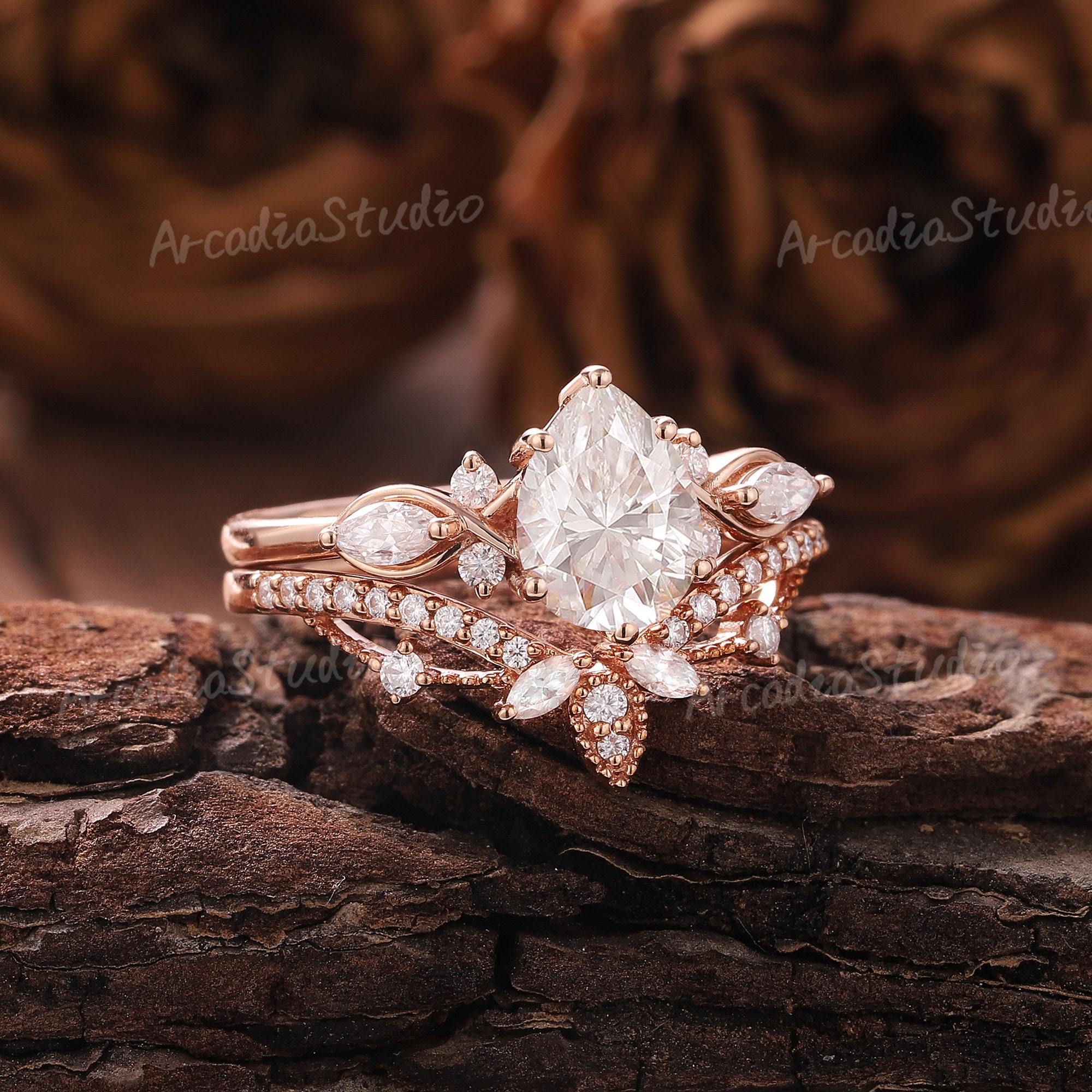Rose gold pear moissanite engagement best sale ring