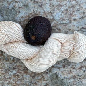 DK weight cotton/wool blend dyed with avocado pits