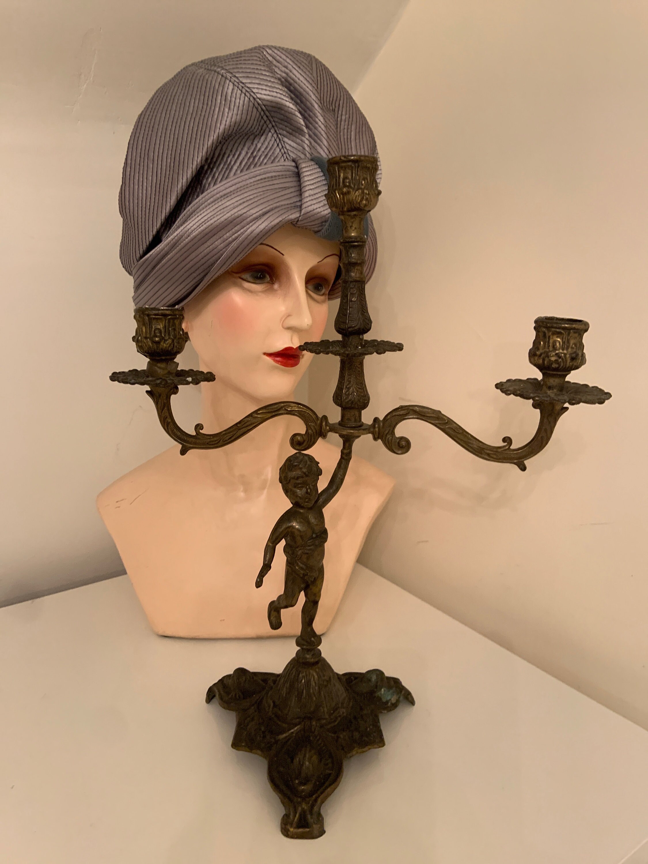 French Gilt Cherub three tier candlestick