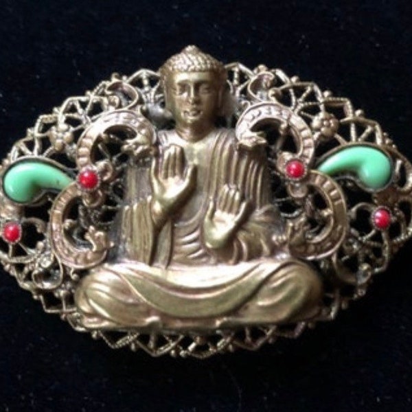 Vintage Czech Oval Gablonz unsigned Buddha brooch. Similar to Max Neiger with 4 red & 2 green cabochon’s