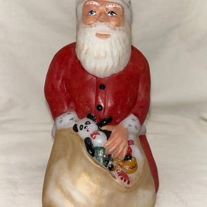 Fenton “Enchantment” Kneeling Santa with his bag of goodies Hand Painted with Gold Sparkles and Glitter