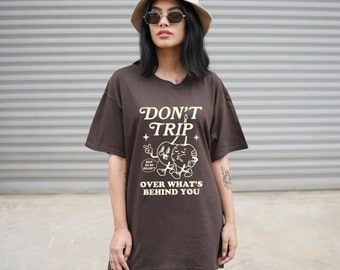 Don't Trip Over What's Behind You 100% Cotton T-shirt