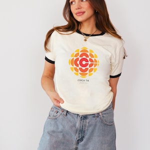 CBC 1974 Logo Ringer T-shirt , CBC Retro Gem Women&#39;s Tee , CBC Classic Logo Unisex T Shirt , Ringer Tee-shirt , Natural Color Ringer Tee