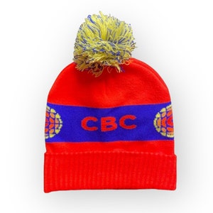 Retro CBK Pom Pom Toque: Rot & Blau Mütze