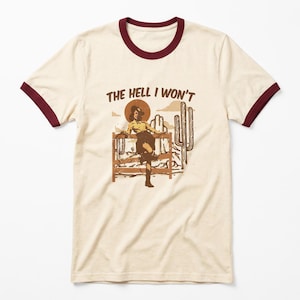 "Retro Cowgirl Ringer Tee: ""The Hell I Won't"" Grafik-T-Shirt."