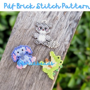 May include: Three small beaded animal figures on a wooden surface. The figures are a gray bunny, a blue elephant, and a green alligator. The figures are all made with small beads and are about 2 inches tall.