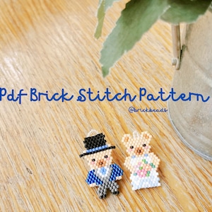 May include: A PDF brick stitch pattern for a beaded wedding couple. The groom is wearing a blue suit with a black top hat. The bride is wearing a white dress with a floral bouquet. The pattern is available on Etsy from @brickbeads.