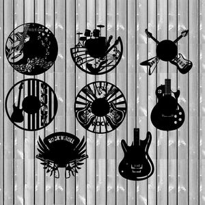 May include: A set of seven black metal wall decor pieces featuring musical instruments and the words "Rock 'n' Roll".