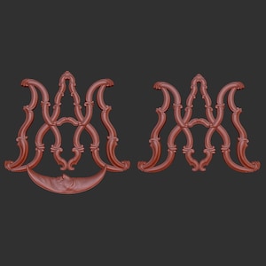 Può includere: Un design stampato in 3D di due lettere M intrecciate in uno stile decorativo e ornato. Il design è di colore marrone rossiccio.