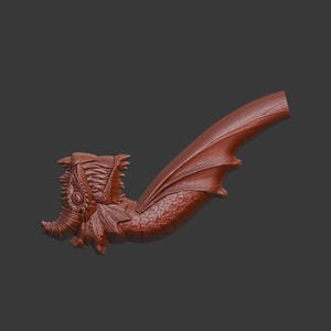 May include: A brown dragon-shaped pipe with intricate details. The pipe features a dragon head with scales, a wing, and a curved stem. The dragon's head has an eye and detailed facial features. The wing is textured, and the stem is smooth.