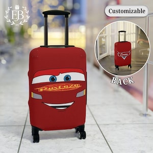 May include: Red rolling suitcase with a cartoon car face design. The design includes blue eyes, a smiling mouth, and the text "Rust-eze". The suitcase has a retractable handle and four black wheels. The word "Customizable" is in the upper right corner.