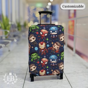 May include: A navy blue suitcase cover featuring cartoon illustrations of superheroes, including Spider-Man, Captain America, and Iron Man. The word "Customizable" is displayed on a white oval. The luggage cover is on a rolling suitcase.