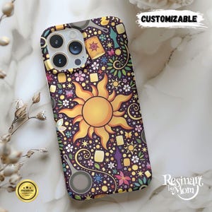 May include: A phone case with a colorful design featuring a large yellow sun, flowers, and lanterns on a dark purple background. The case has the word "CUSTOMIZABLE" printed on it.