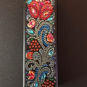 Estuche floral para anteojos defectuoso (la parte posterior del estuche está rayada, ver fotos)