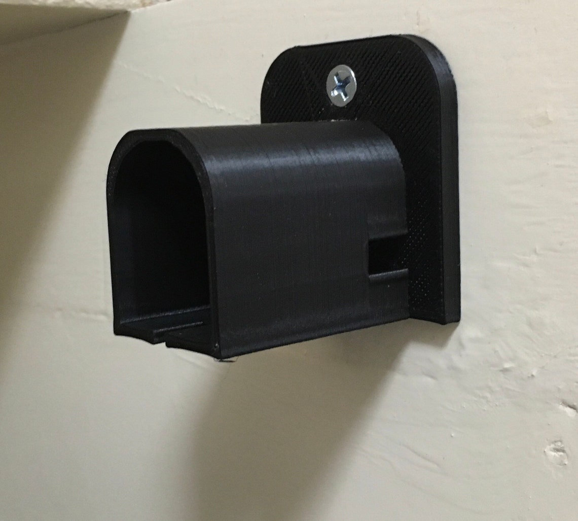 Four 3D Printed Battery holders for RYOBI 18v batteries. Free Etsy