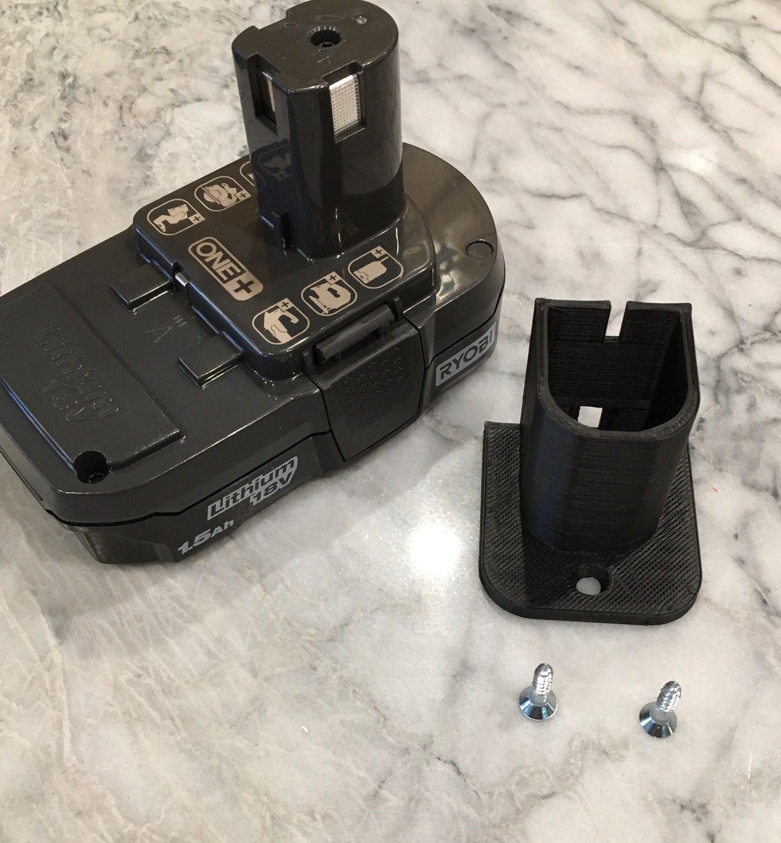 Four 3D Printed Battery holders for RYOBI 18v batteries. Free Etsy