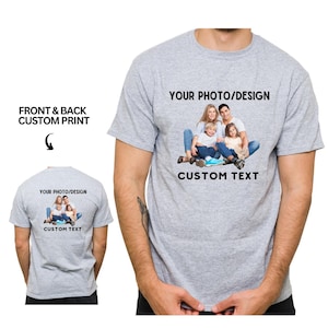 May include: A grey t-shirt with a custom photo and text design. The front of the shirt displays a family photo with the text "YOUR PHOTO/DESIGN" and "CUSTOM TEXT". The back of the shirt also features the same design.