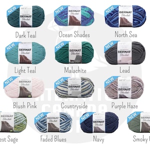May include: Assortment of Bernat Blanket yarn in various colors, including teal, green, blue, pink, and gray. Each skein is labeled "NEW" and features the Bernat Blanket logo.