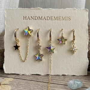 Set med guldstjärnörhängen, Aurora kristallstjärnörhängen, asymmetriska hängande örhängen, Celestial öronstapel, present till henne