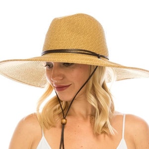 Best Seller! Premium quality straw hat. Hand woven hat with wide brim hat. Finished with a wide chin tie made of cotton ribbon.