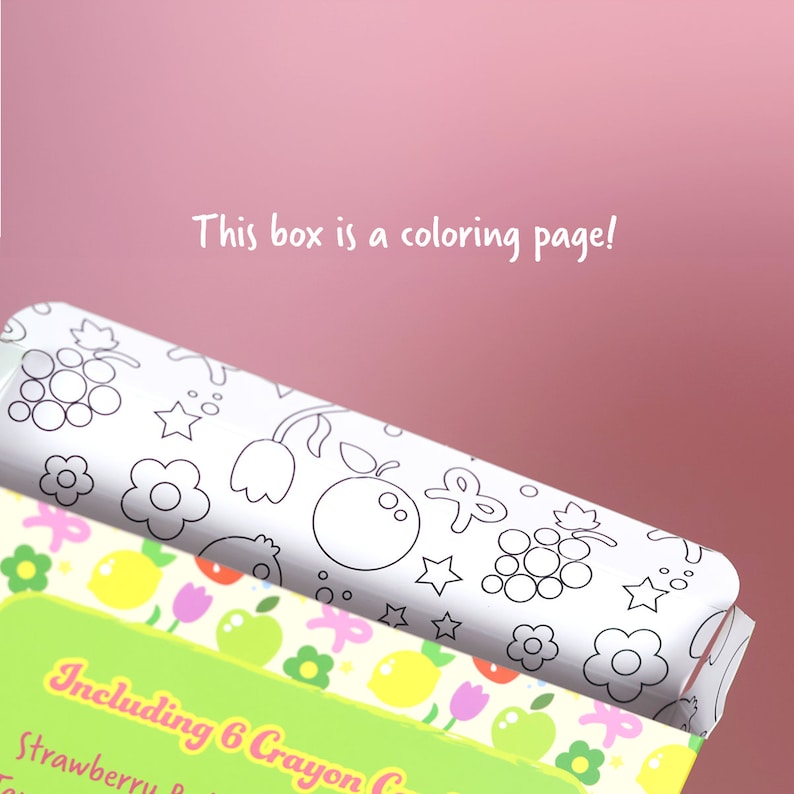 May include: A white box with a black and white coloring page of fruits and flowers. The box says "This box is a coloring page!" and "Including 6 Crayon Crayons".