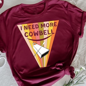 Music Humor T-Shirt, I Need More Cowbell Retro Shirt, Vintage Fun Cowbell Design, Funny Music Lover Shirt, Gift for Cowbell Fans