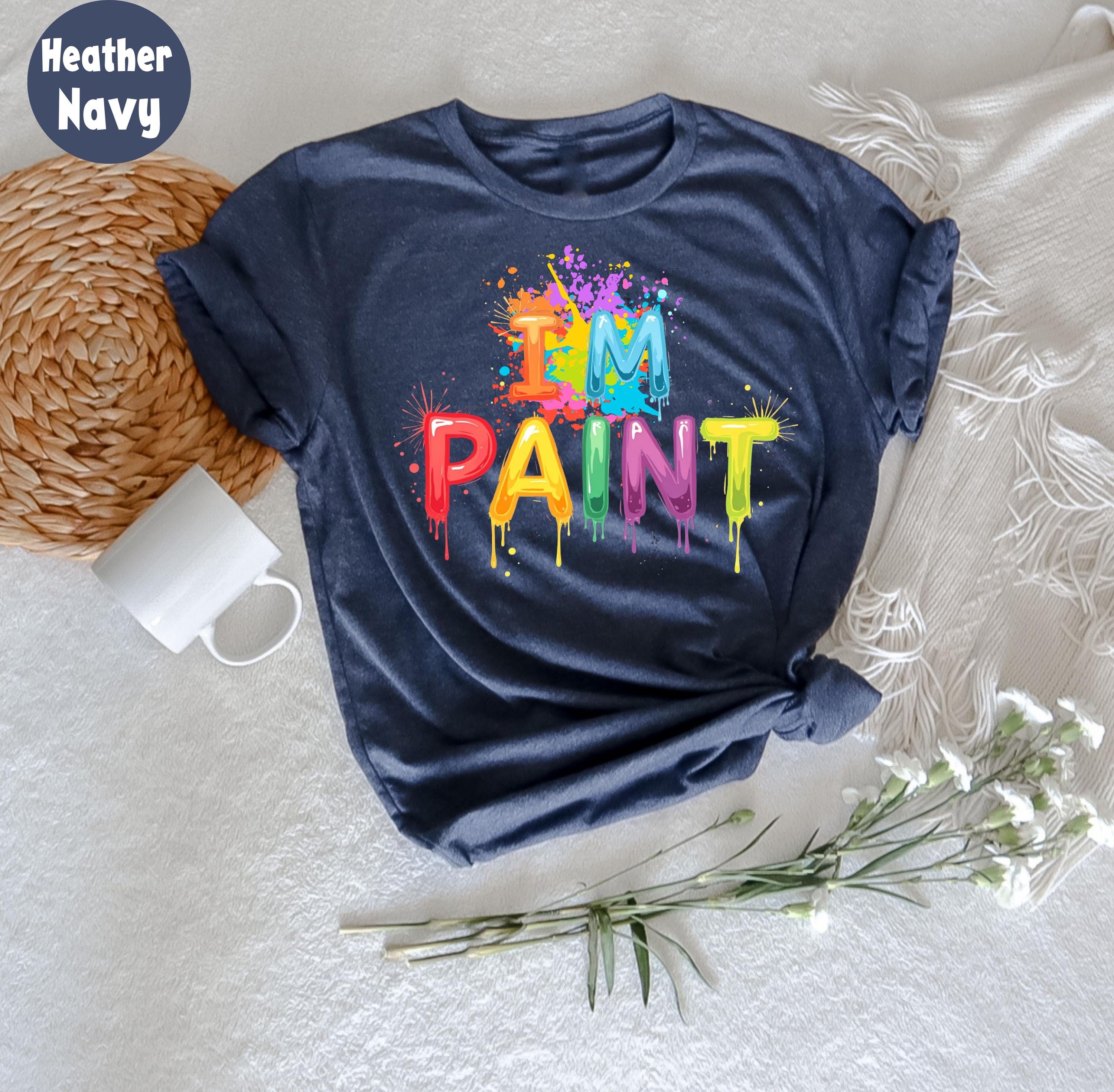 Vista Lateral Manos Pintando Camiseta | Foto Gratis