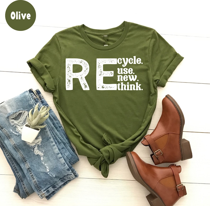 May include: Olive green t-shirt with white text that reads "REcycle. use. new. think."